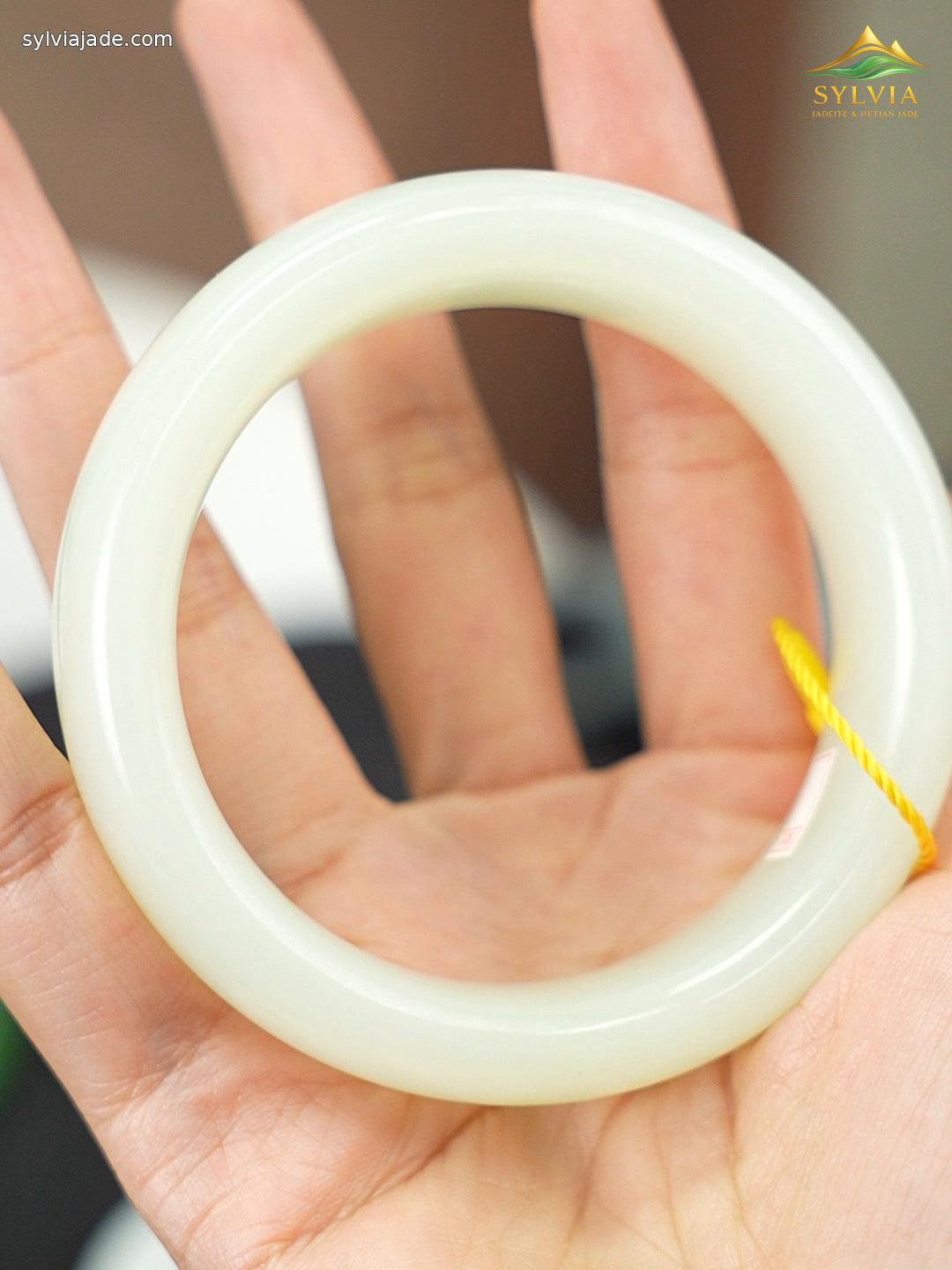 Full front view of the 55 mm green-white Hetian nephrite jade bangle B12609024874