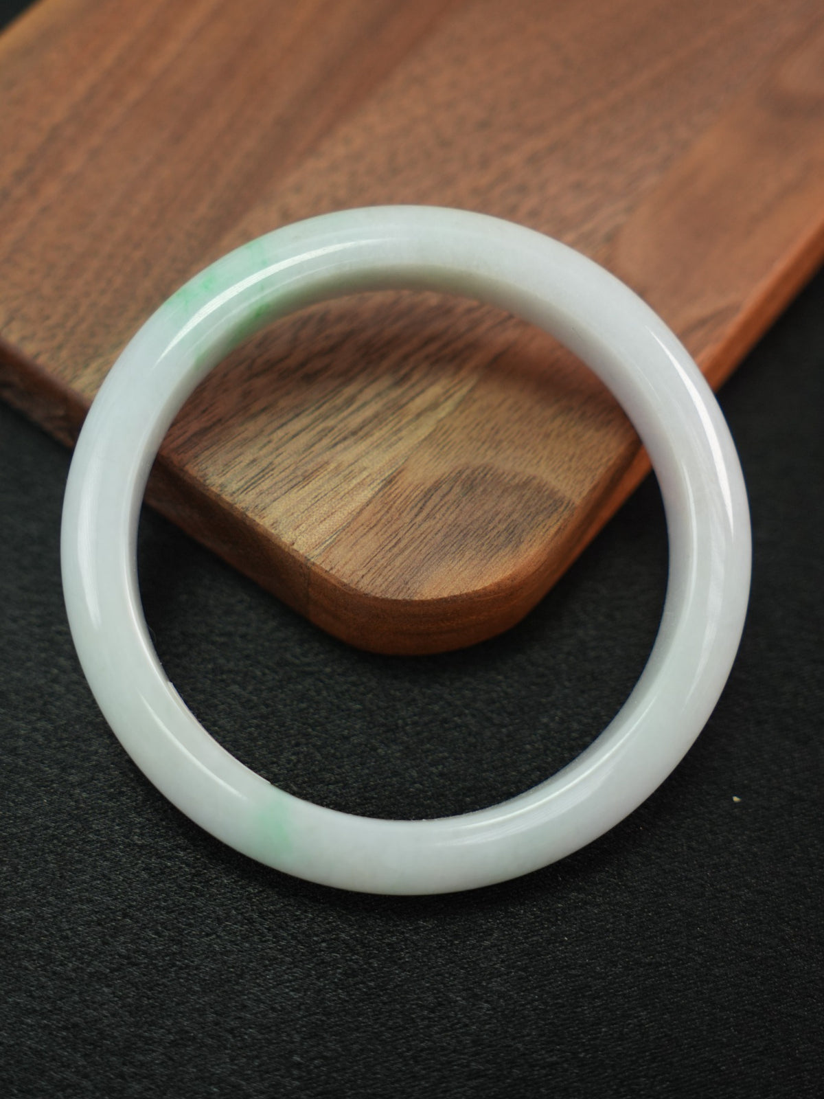 Natural Type A jadeite bangle, pale green and lavender, 61 mm