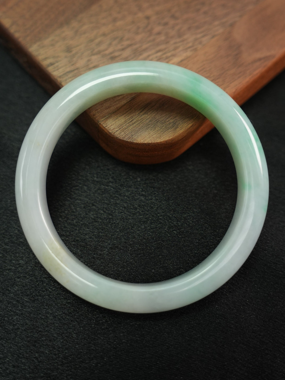 Natural Type A jadeite bangle, pale green and light lavender, 58 mm