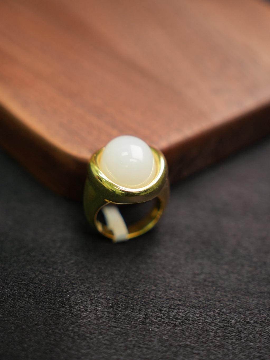P2609002911 white Hetian nephrite jade ring in a gold-tone silver setting