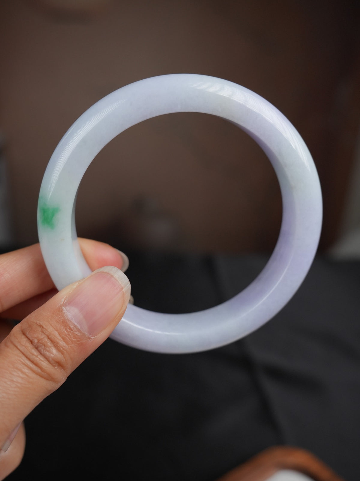 Pale lavender Type A jadeite bangle with green accent, view 1