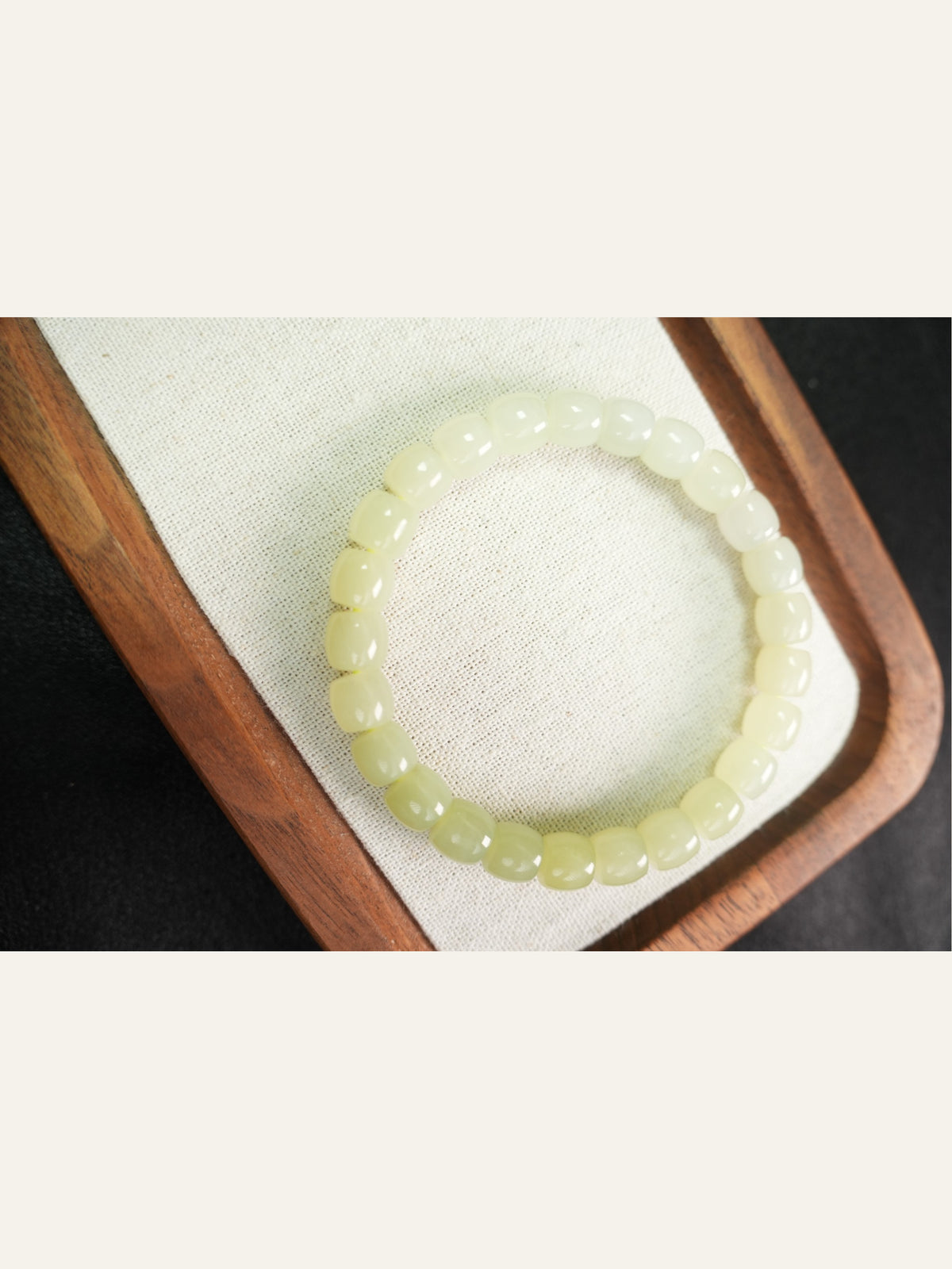 Pale yellow-green Hetian nephrite jade bracelet, 8 × 7 mm beads