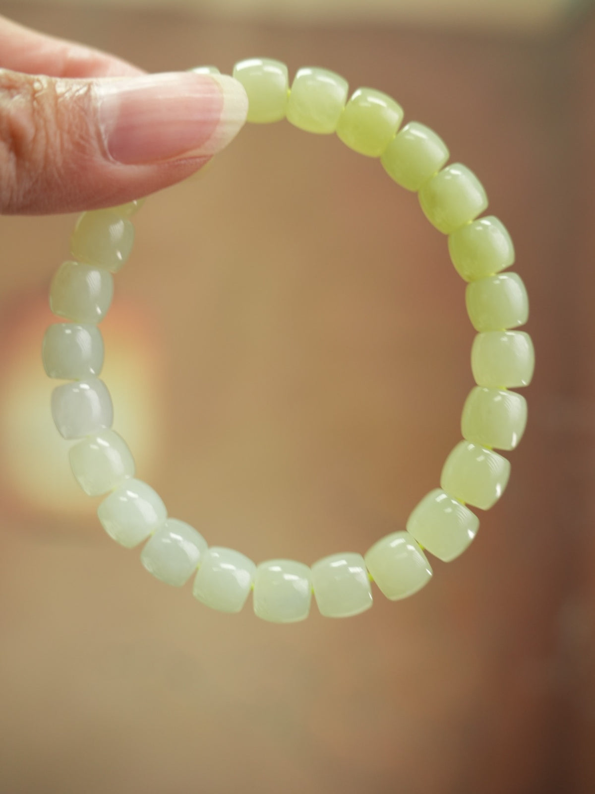 Pale yellow-green Hetian nephrite jade bracelet, 8 × 7 mm beads
