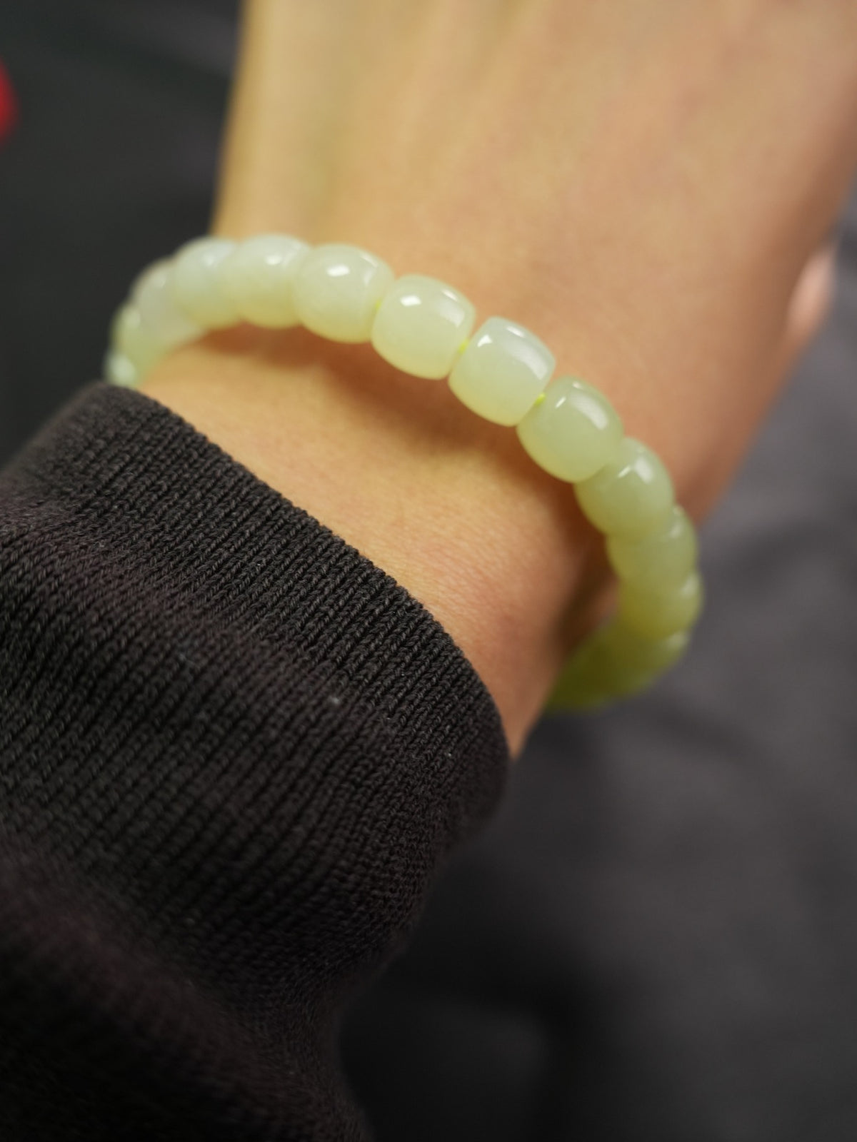 Pale yellow-green Hetian nephrite jade bracelet — product and wrist view