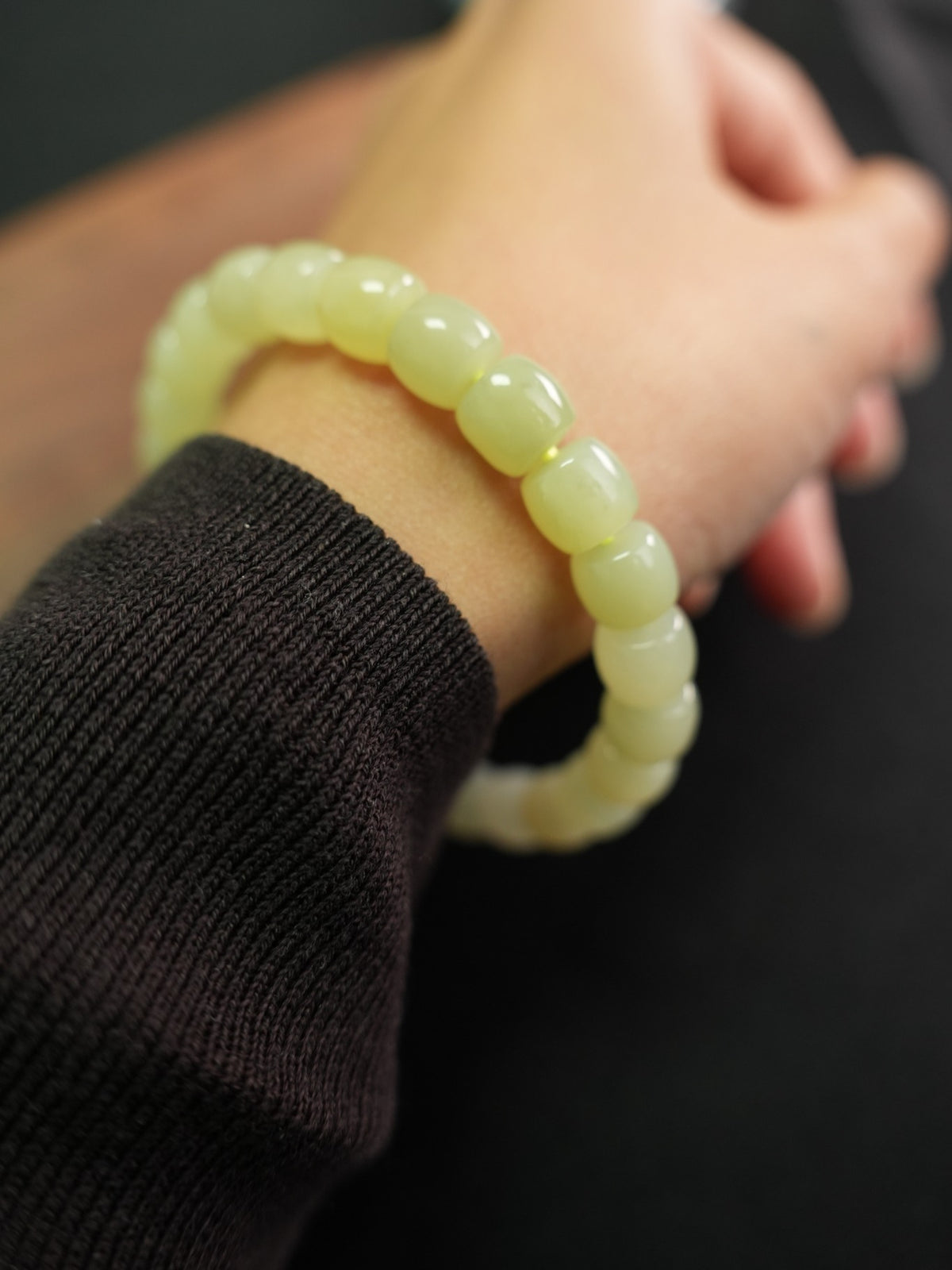 Pale yellow-green Hetian nephrite jade bracelet — product and wrist view