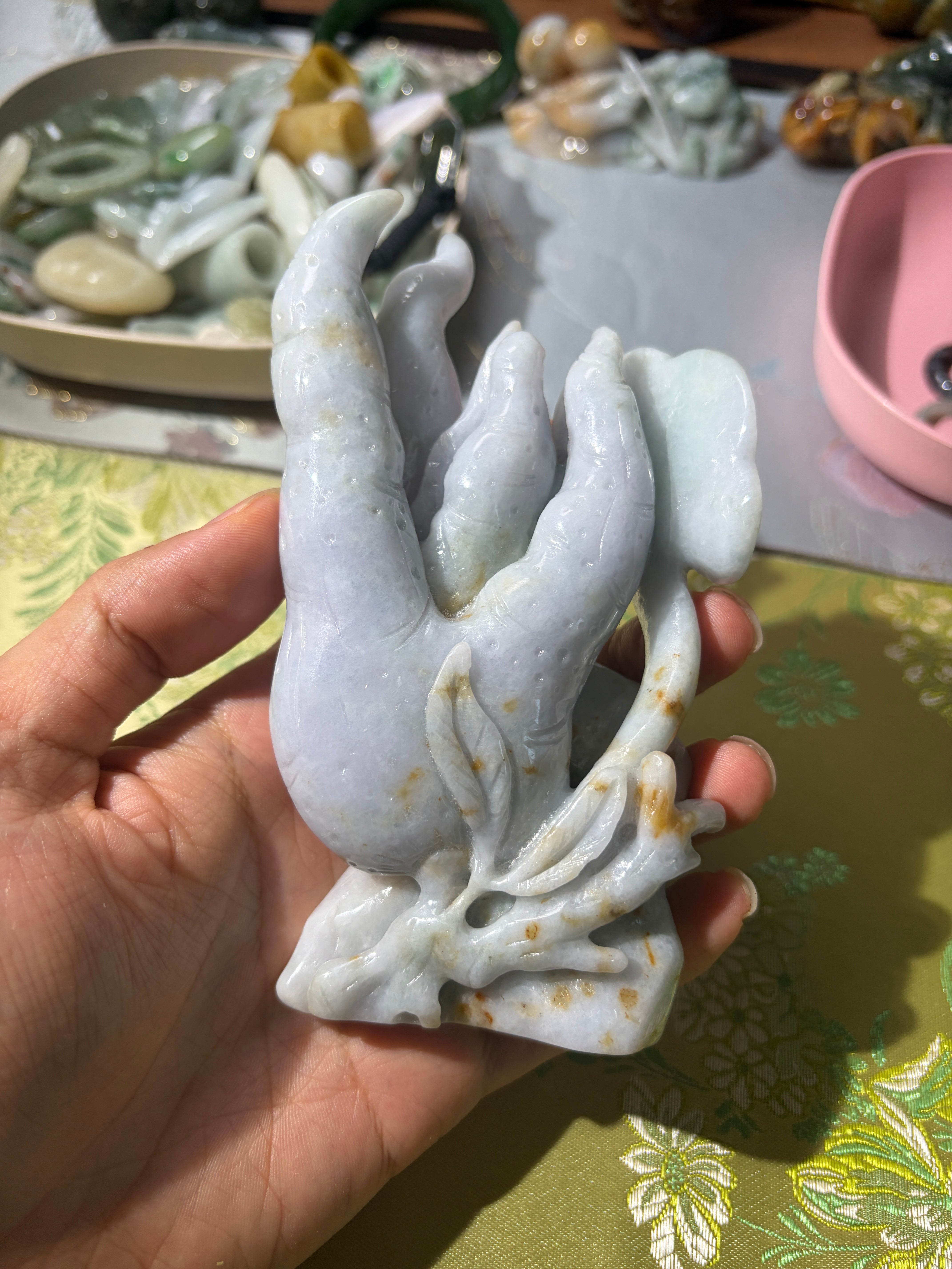 Carved pale jadeite Buddha’s hand citron display piece with natural russet accents