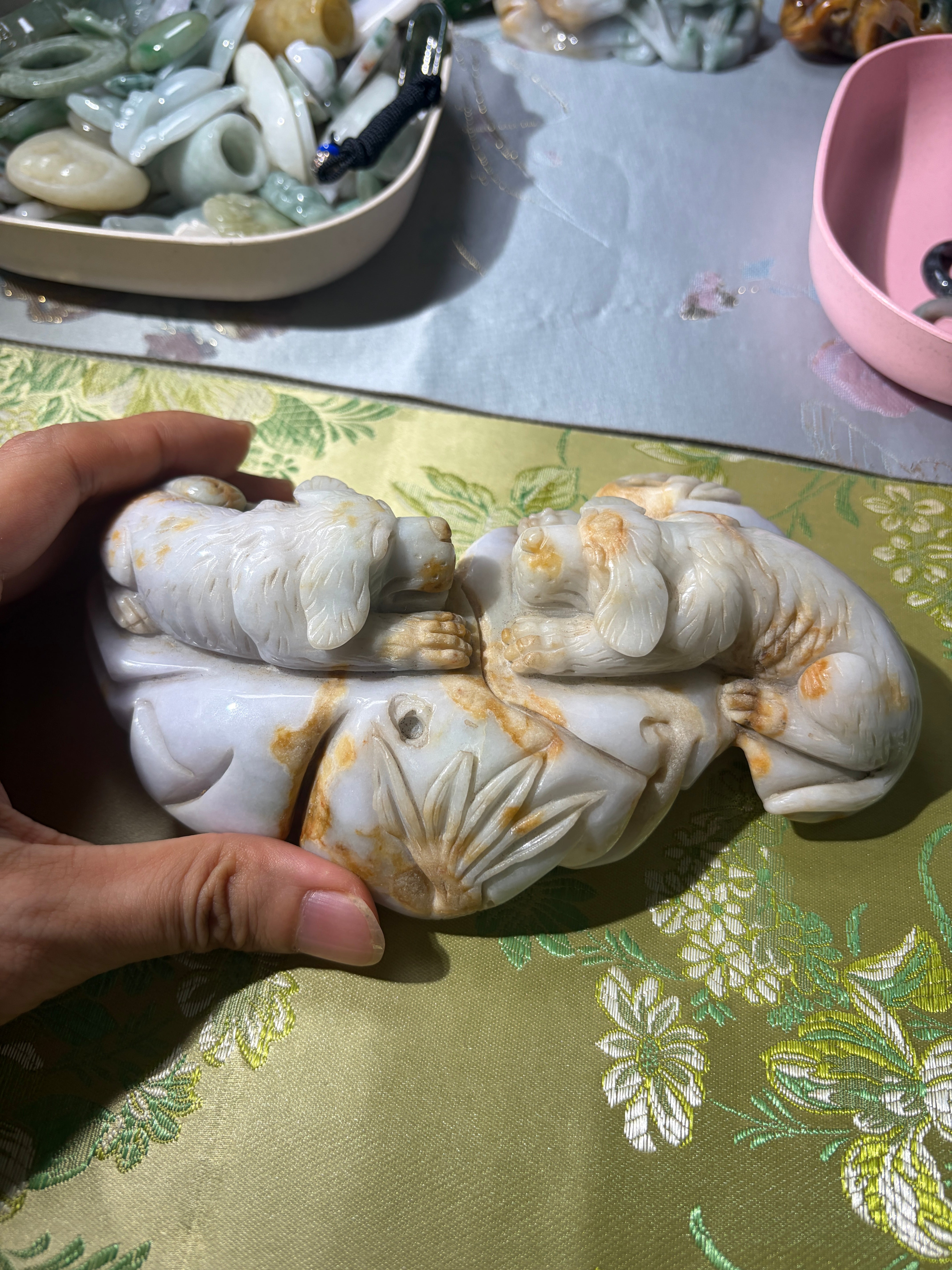 Carved jadeite companion dogs display piece with natural russet accents
