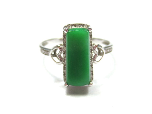 Green rectangular jadeite ring with openwork shoulders and a fine halo