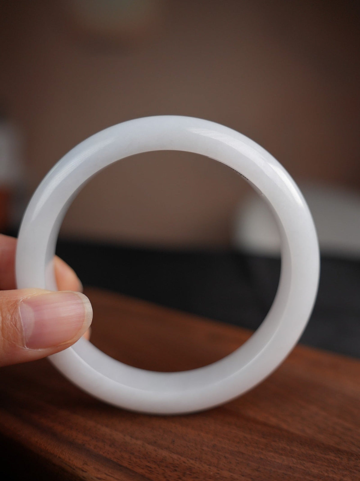 60 mm Type A jadeite bangle with pale green and lavender tones, actual piece P2509005811