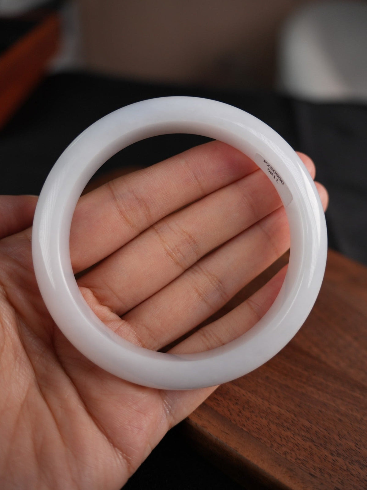 60 mm Type A jadeite bangle with pale green and lavender tones, actual piece P2509005811