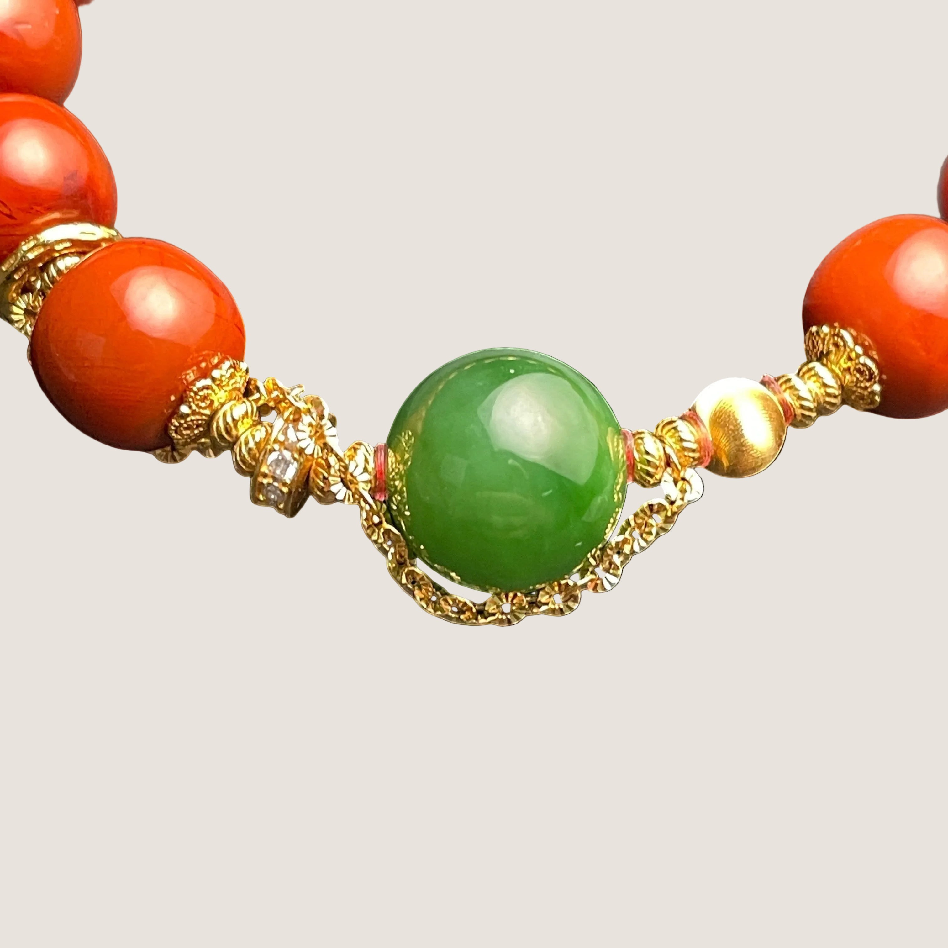 Sylvia Jewelry Nanhong Agate and Hetian Green Jade bracelet with gold-plated silver spacers and diamond accents.