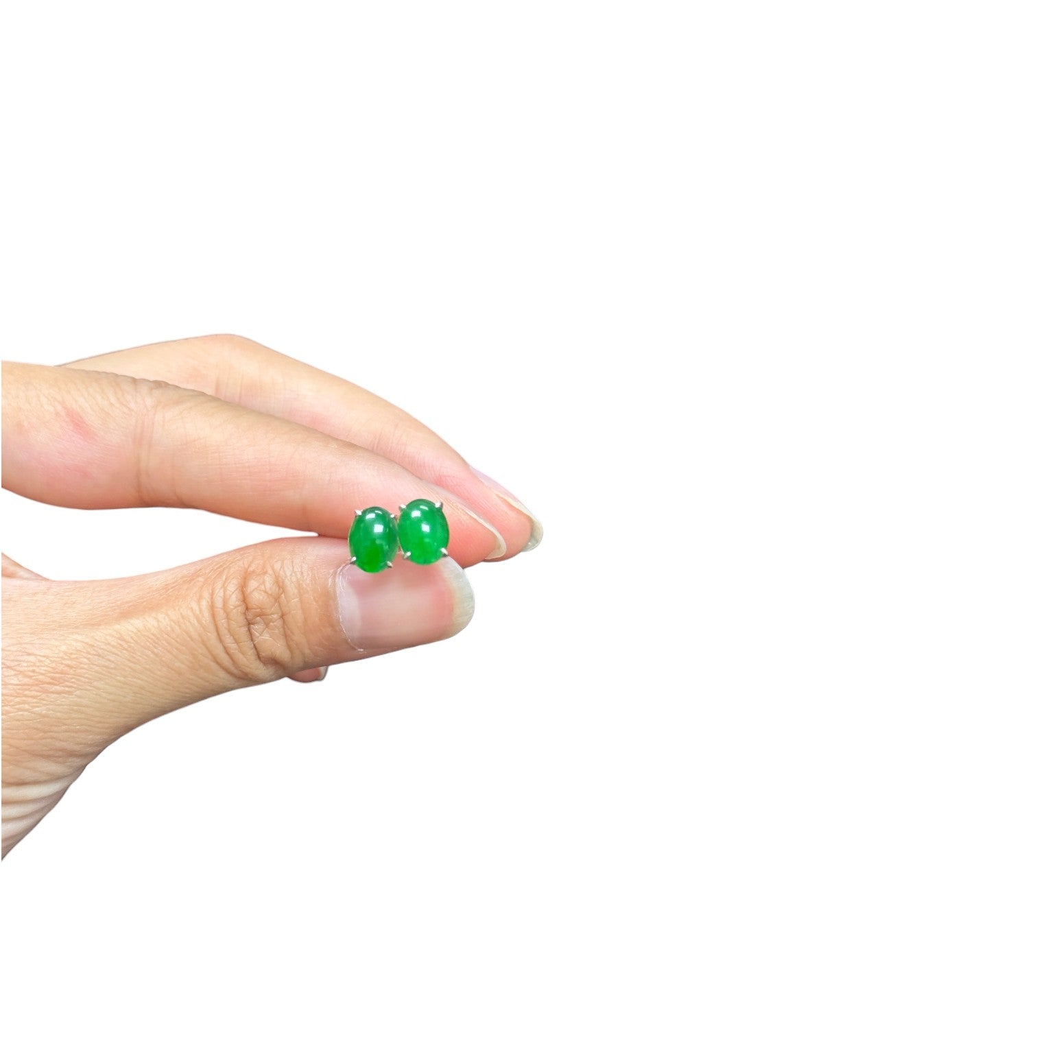Sylvia Jewelry apple green jadeite oval stud earrings with minimalist sterling silver four-prong settings.