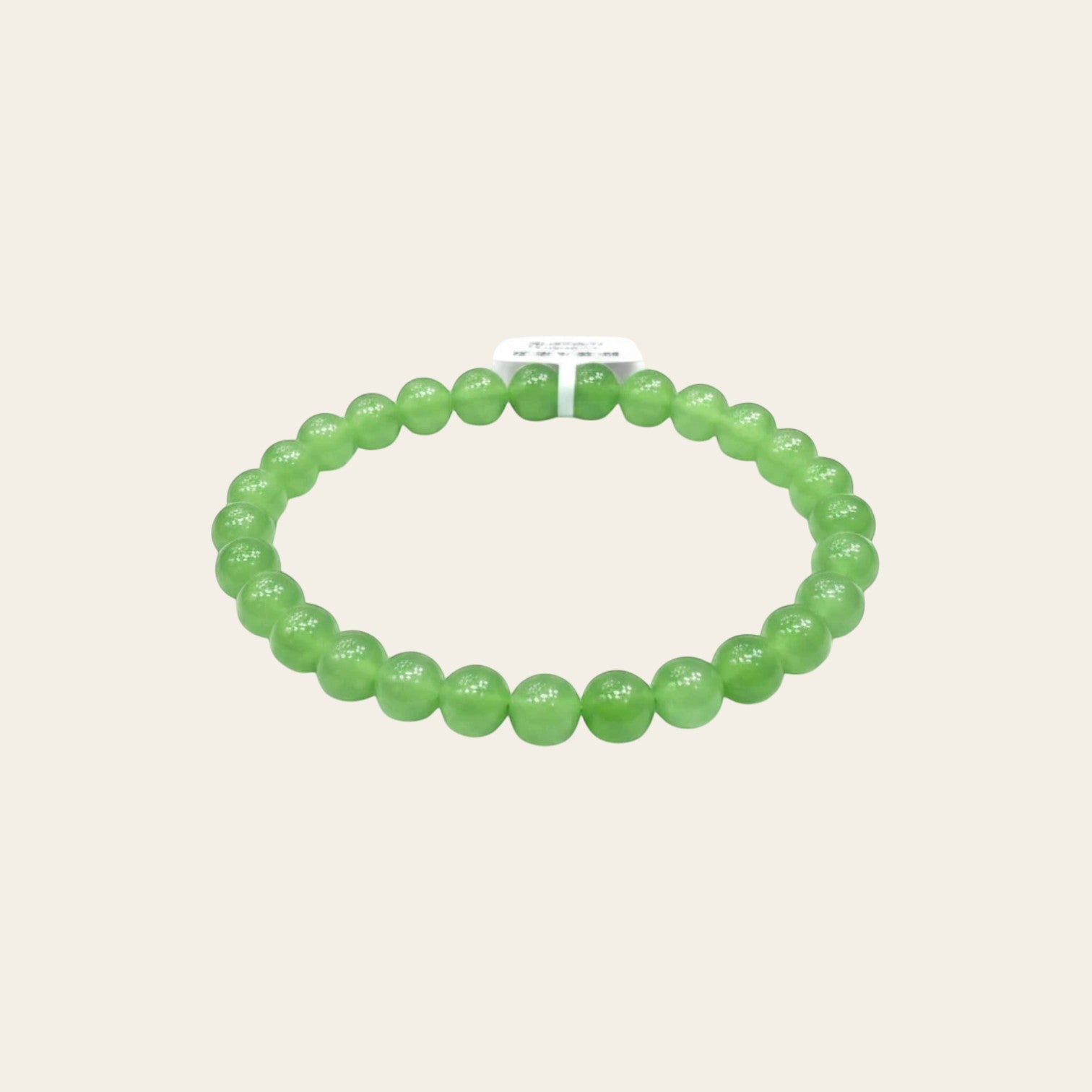 Sylvia Jewelry apple green Ulan-Ude nephrite jade bead bracelet with a smooth, polished finish.