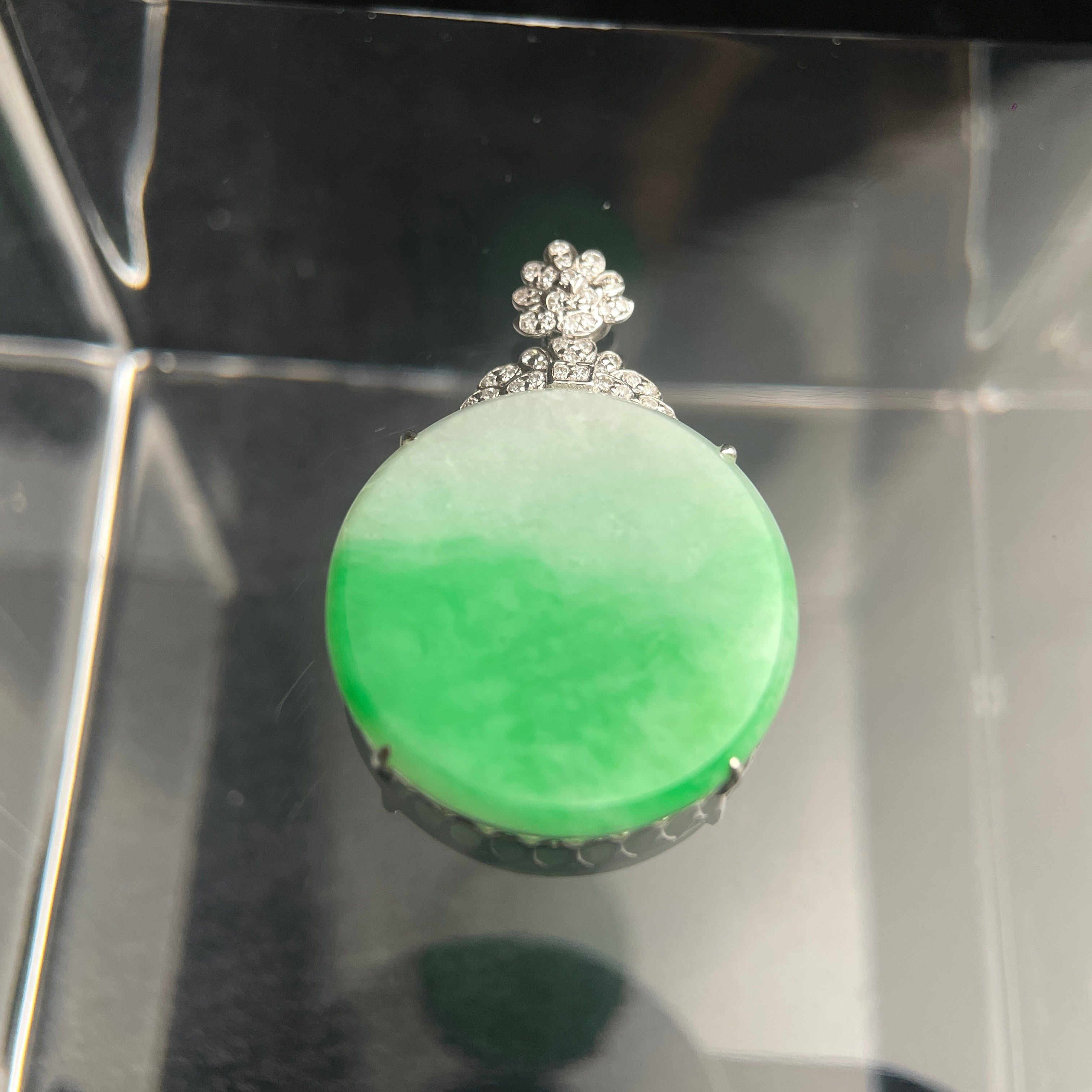 Sylvia Jewelry bright green jadeite jade pendant plaque in an 18K gold setting with a diamond-encrusted flower bail.
