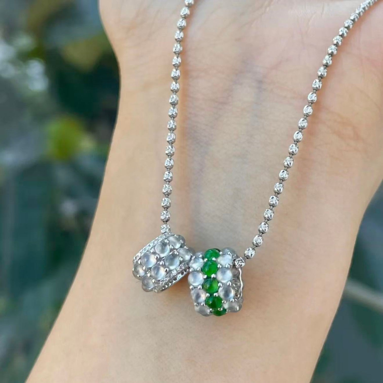 Sylvia Jewelry 18k white gold cylinder charm with icy jadeite beads and micro-pavé diamonds on a delicate chain.