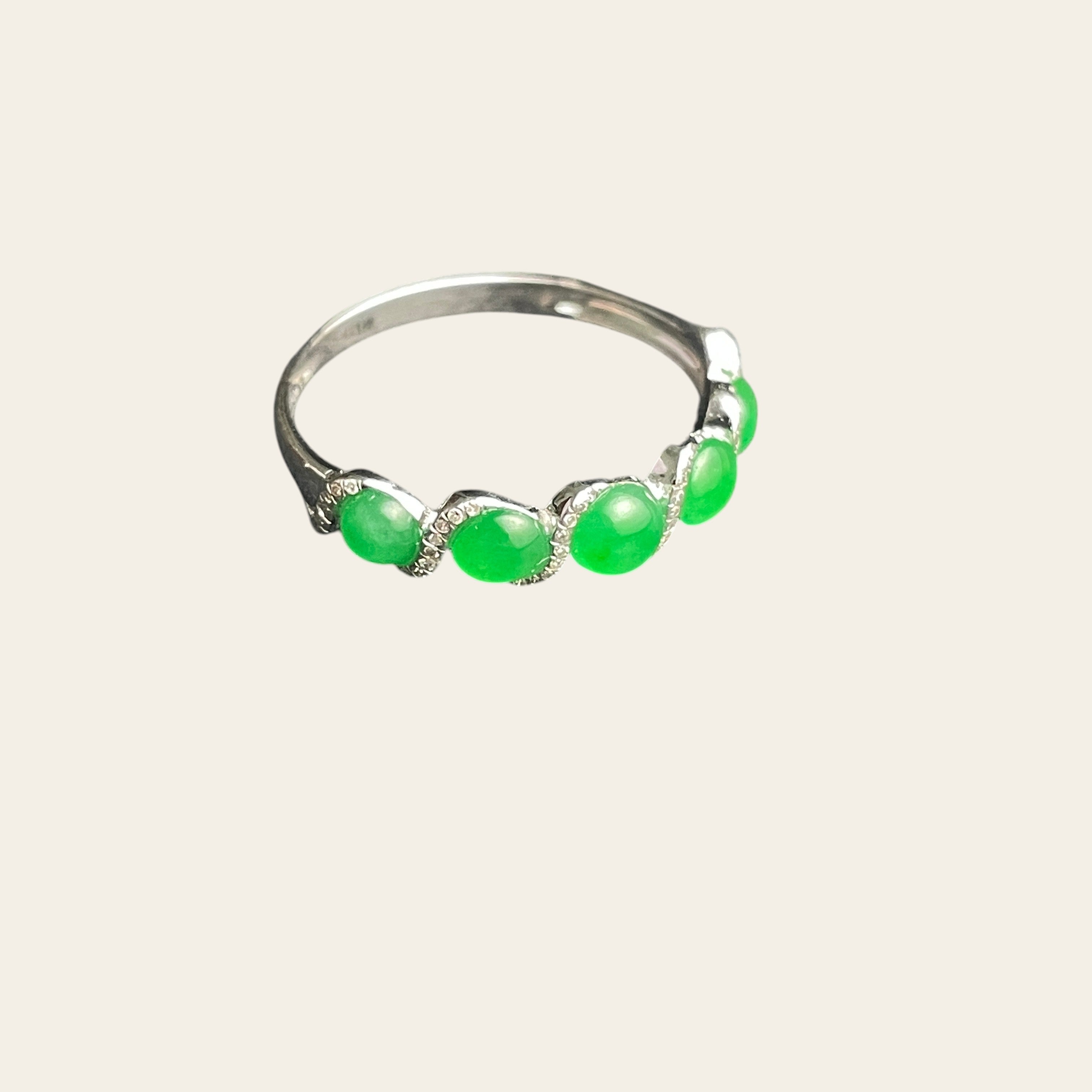 Sylvia Jewelry Radiant Wave ring featuring five apple green jadeite cabochons set in 18k white gold with diamonds.