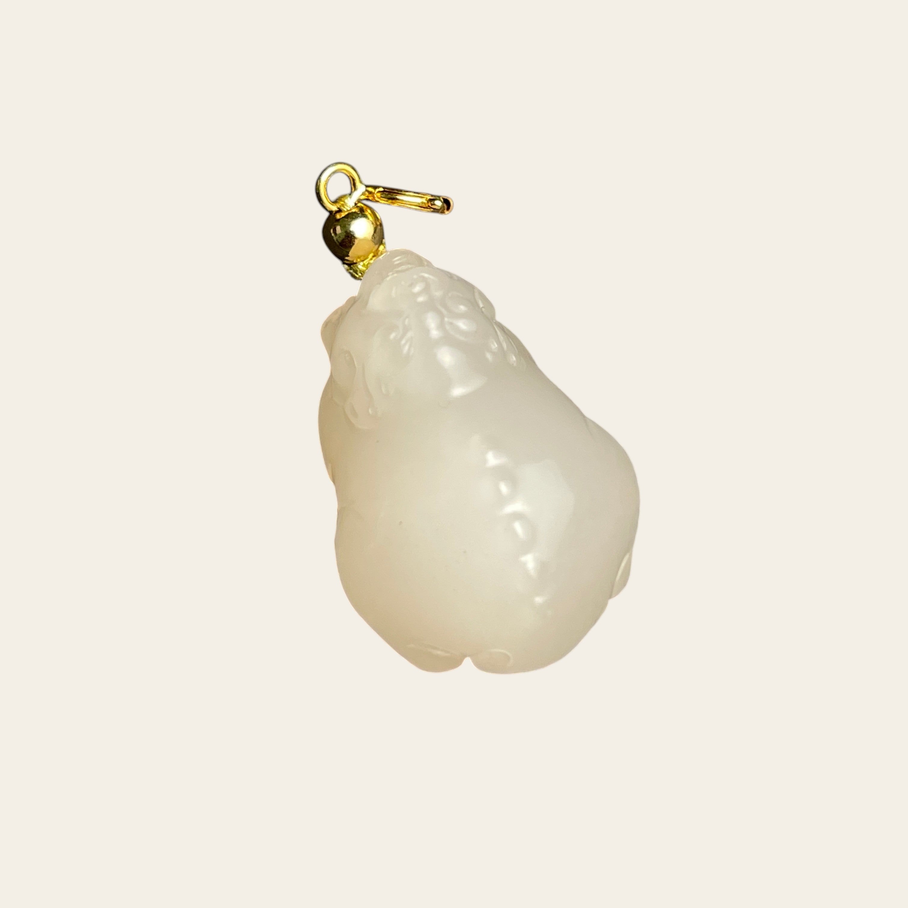 Sylvia Jewelry lotus-root pink Hetian nephrite jade PiXiu charm with a polished gold clasp for luxury accessories.