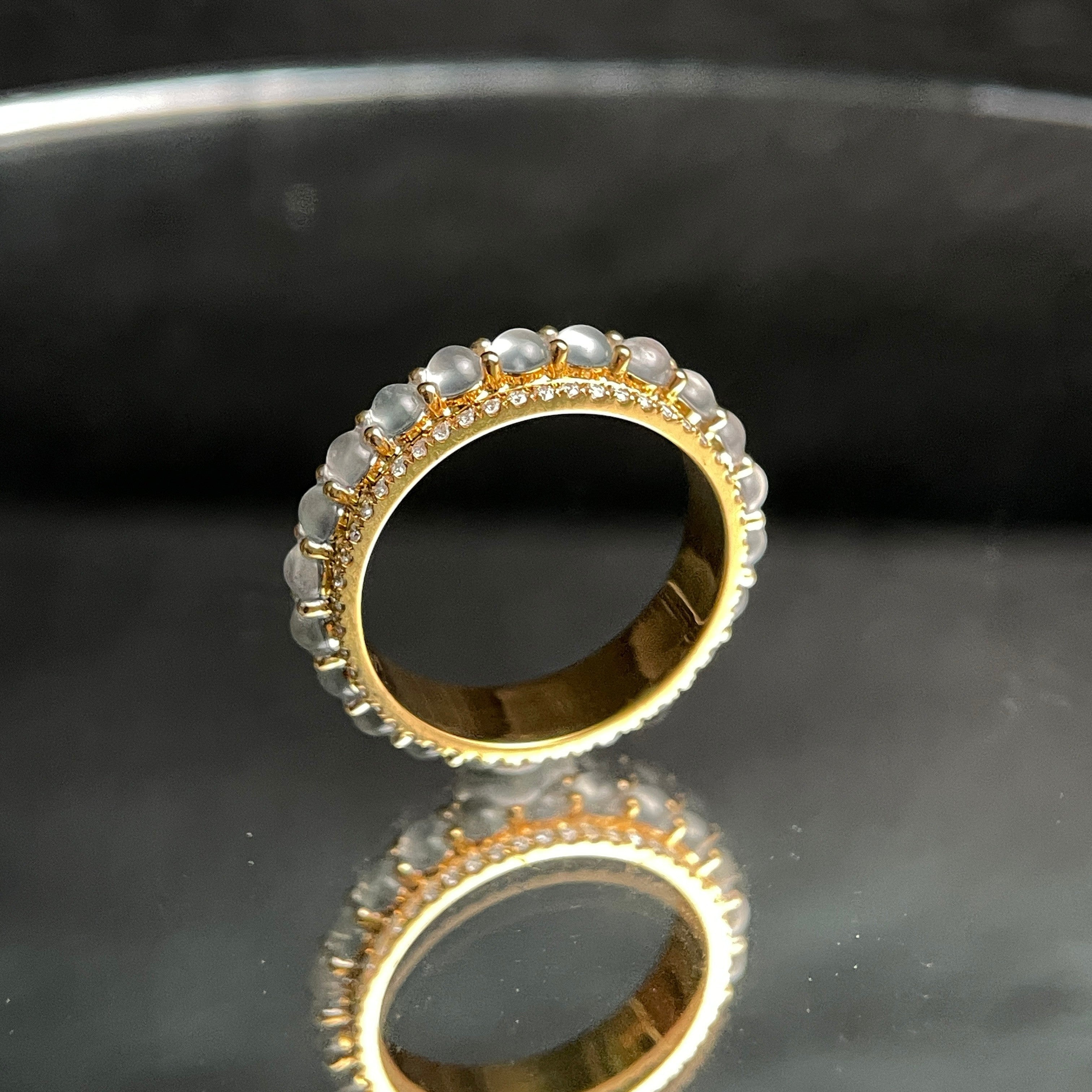 Sylvia Jewelry 18K gold ring with rotating white jadeite cabochons and small diamonds