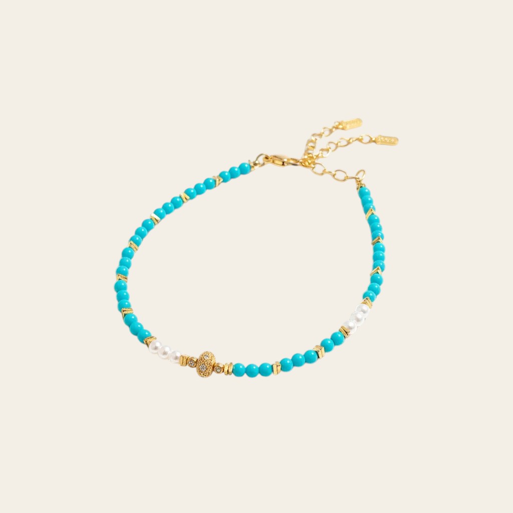 Sylvia Jewelry 蓝绿色绿松石珍珠手链,金色镀层细节,适合日常佩戴。