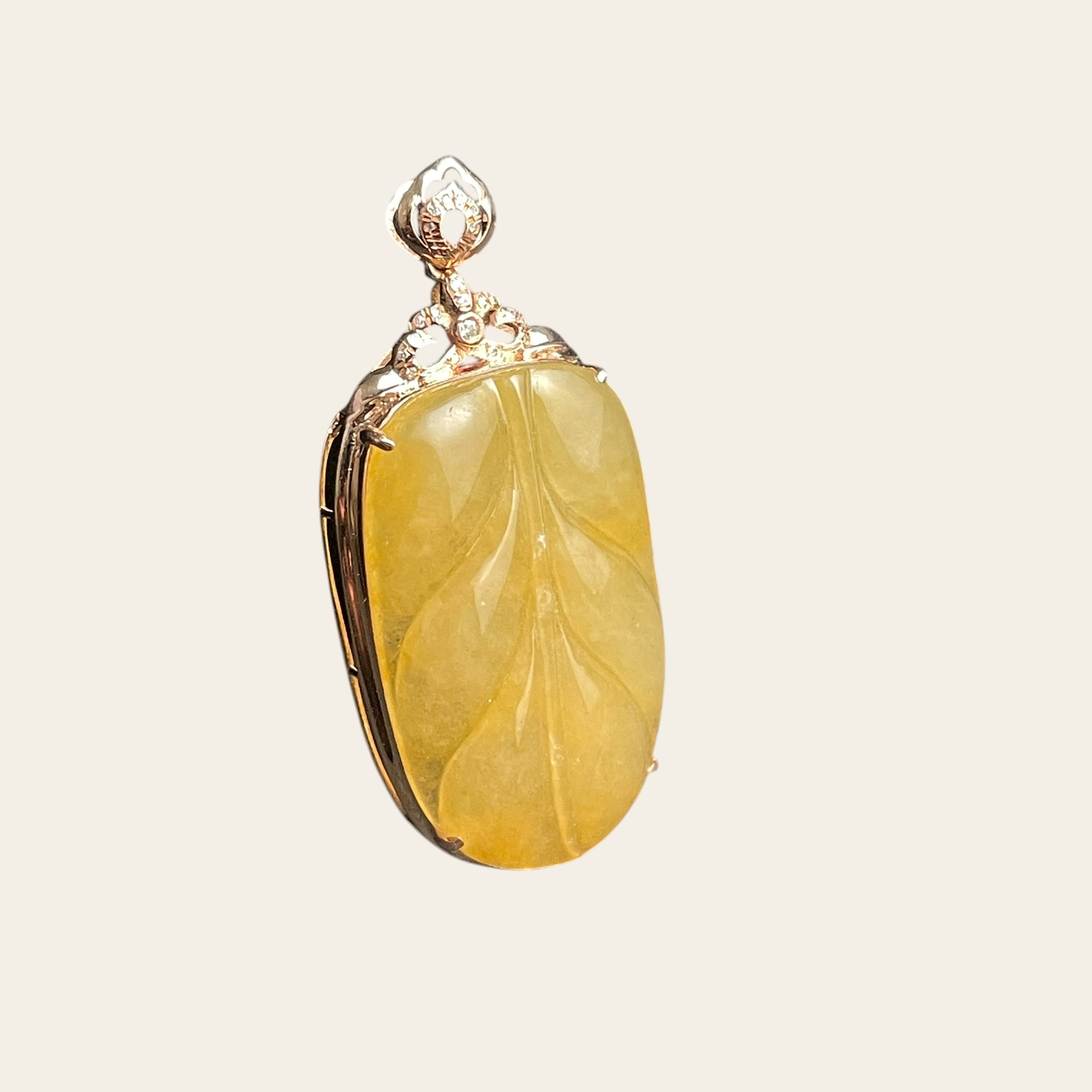 Sylvia Jewelry yellow jadeite leaf pendant in 18k rose gold with diamond pavé and filigree bail.