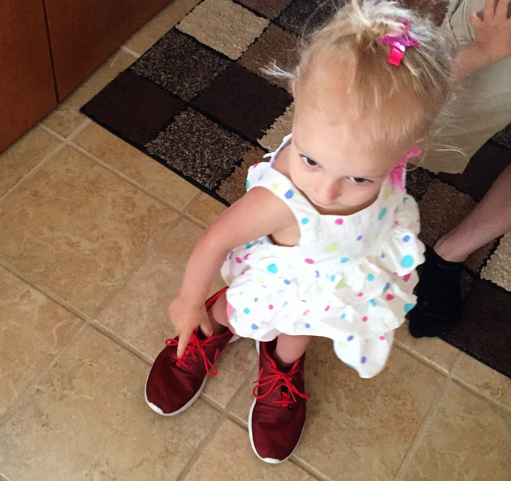 trying on uncles shoes