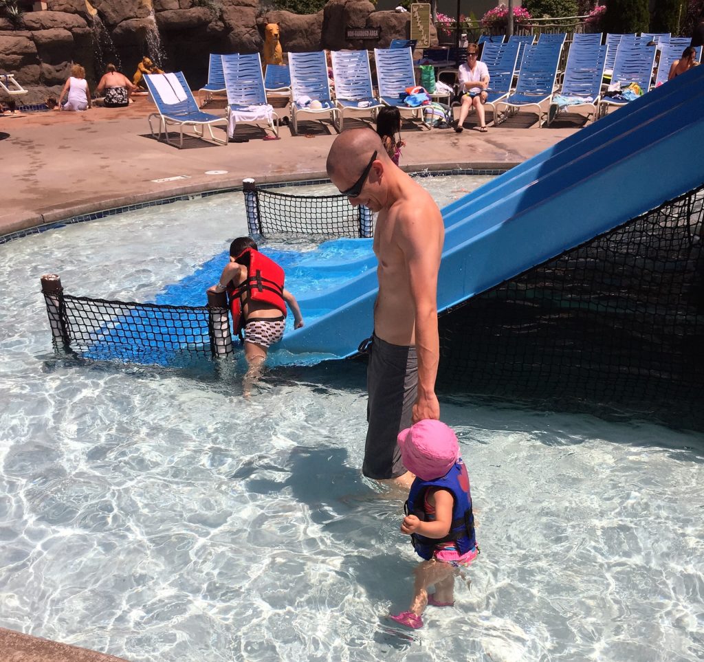 going down the slides with daddy