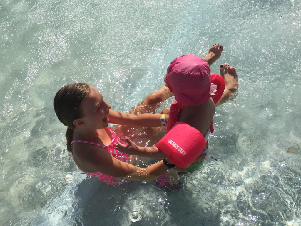 auntie and toddler swimming