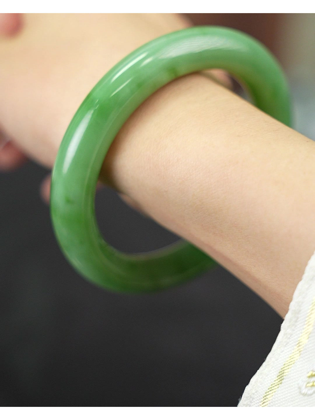 53.5mm green Hetian nephrite jade bangle 2026-100204 worn-side view