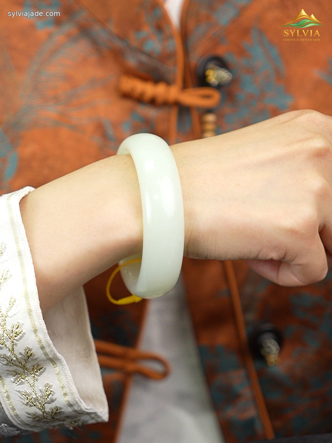 Pale green-white Hetian nephrite jade bangle B12609024874, worn angle 2