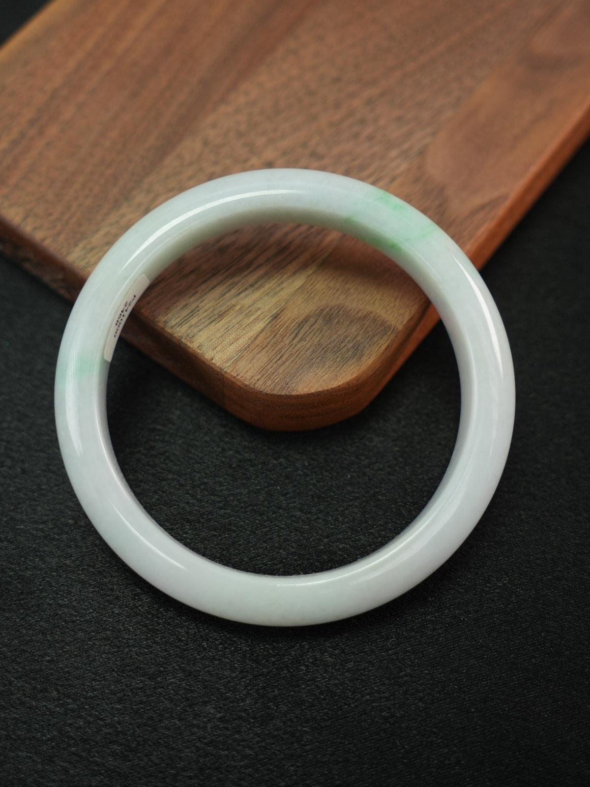 Natural Type A jadeite bangle, pale green and lavender, 61 mm