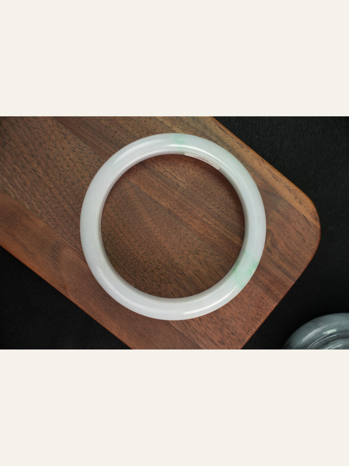 Natural Type A jadeite bangle, pale green and lavender, 61 mm