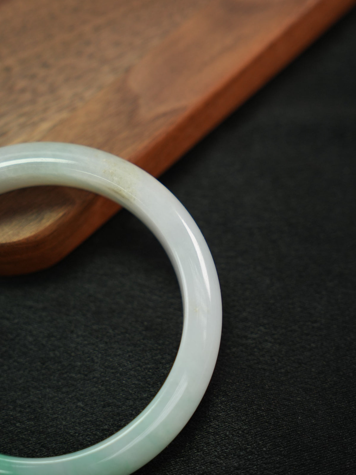 Natural Type A jadeite bangle, pale green and light lavender, 58 mm