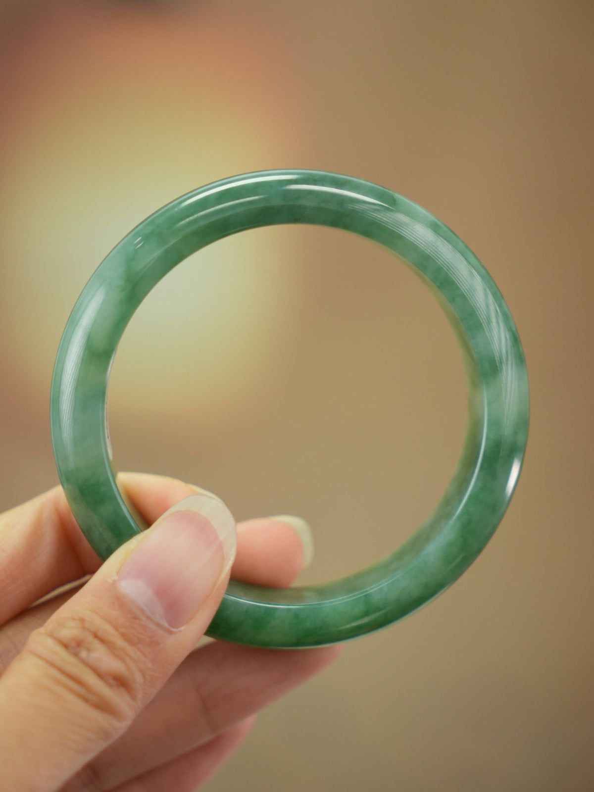 Green natural Type A jadeite bangle, 54 mm