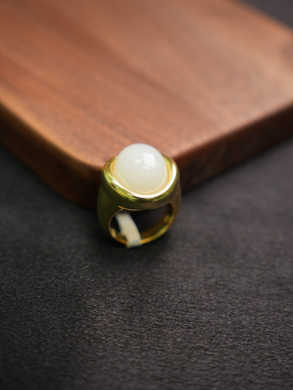 P2609002911 white Hetian nephrite jade ring in a gold-tone silver setting