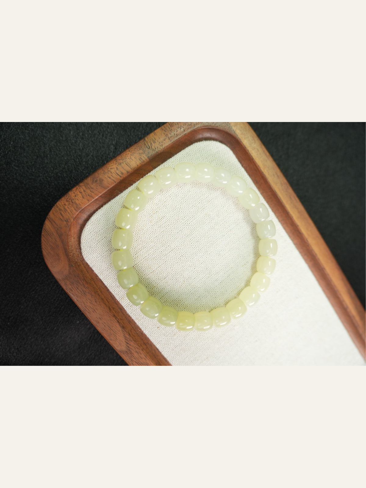 Pale yellow-green Hetian nephrite jade bracelet, 8 × 7 mm beads