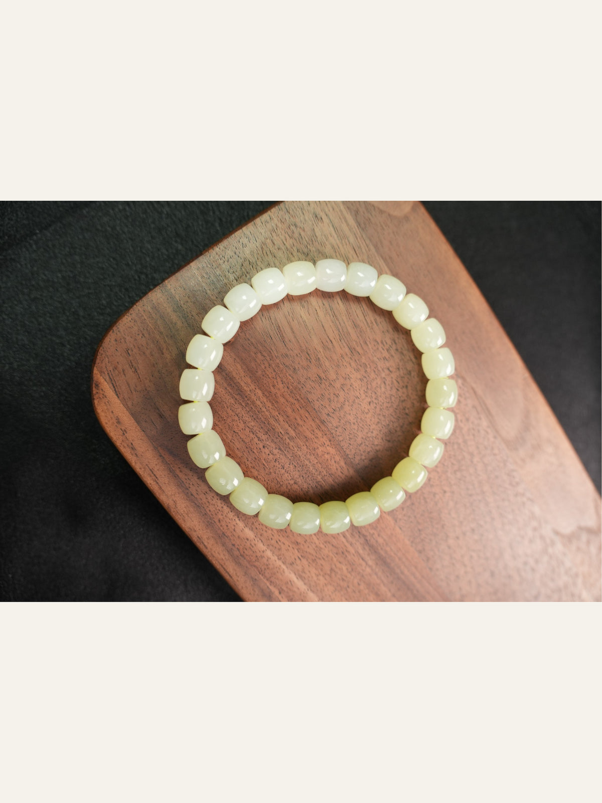 Pale yellow-green Hetian nephrite jade bracelet, 8 × 7 mm beads
