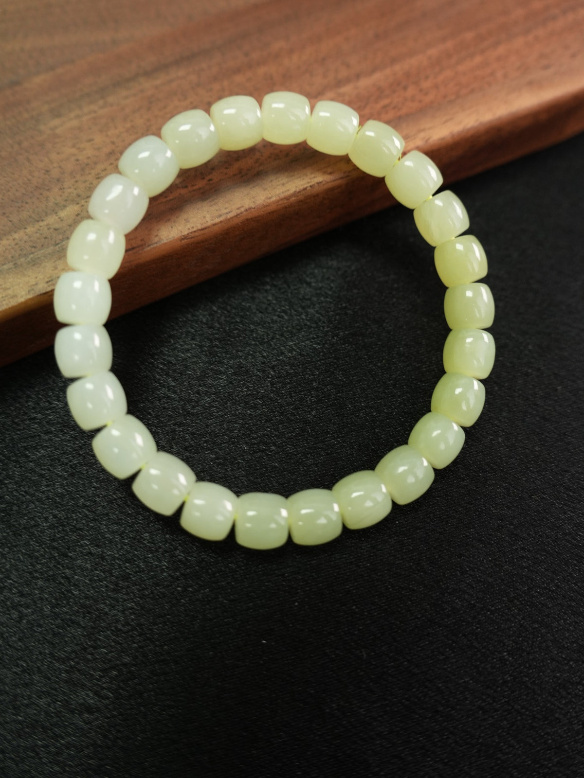 Pale yellow-green Hetian nephrite jade bracelet — product and wrist view