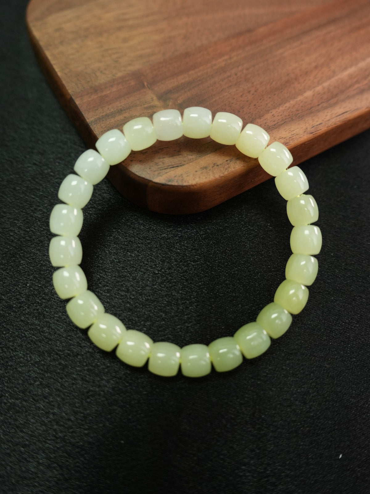 Pale yellow-green Hetian nephrite jade bracelet — product and wrist view