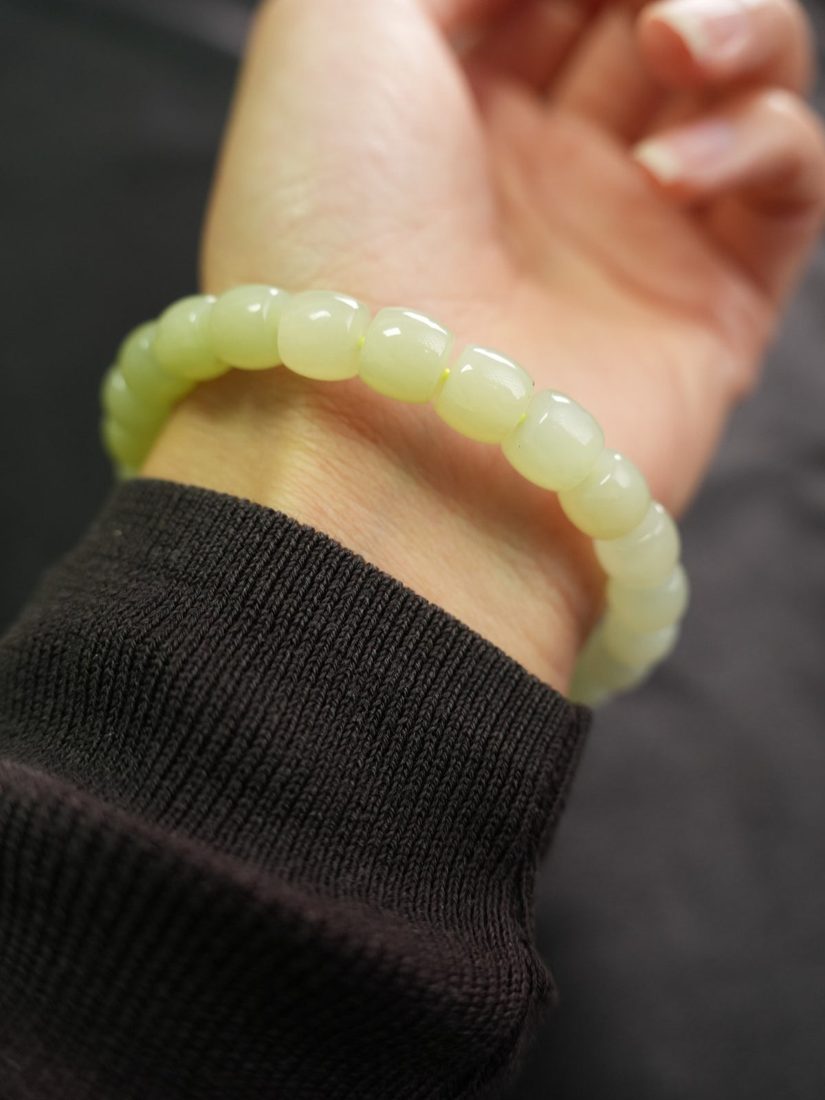 Pale yellow-green Hetian nephrite jade bracelet — product and wrist view