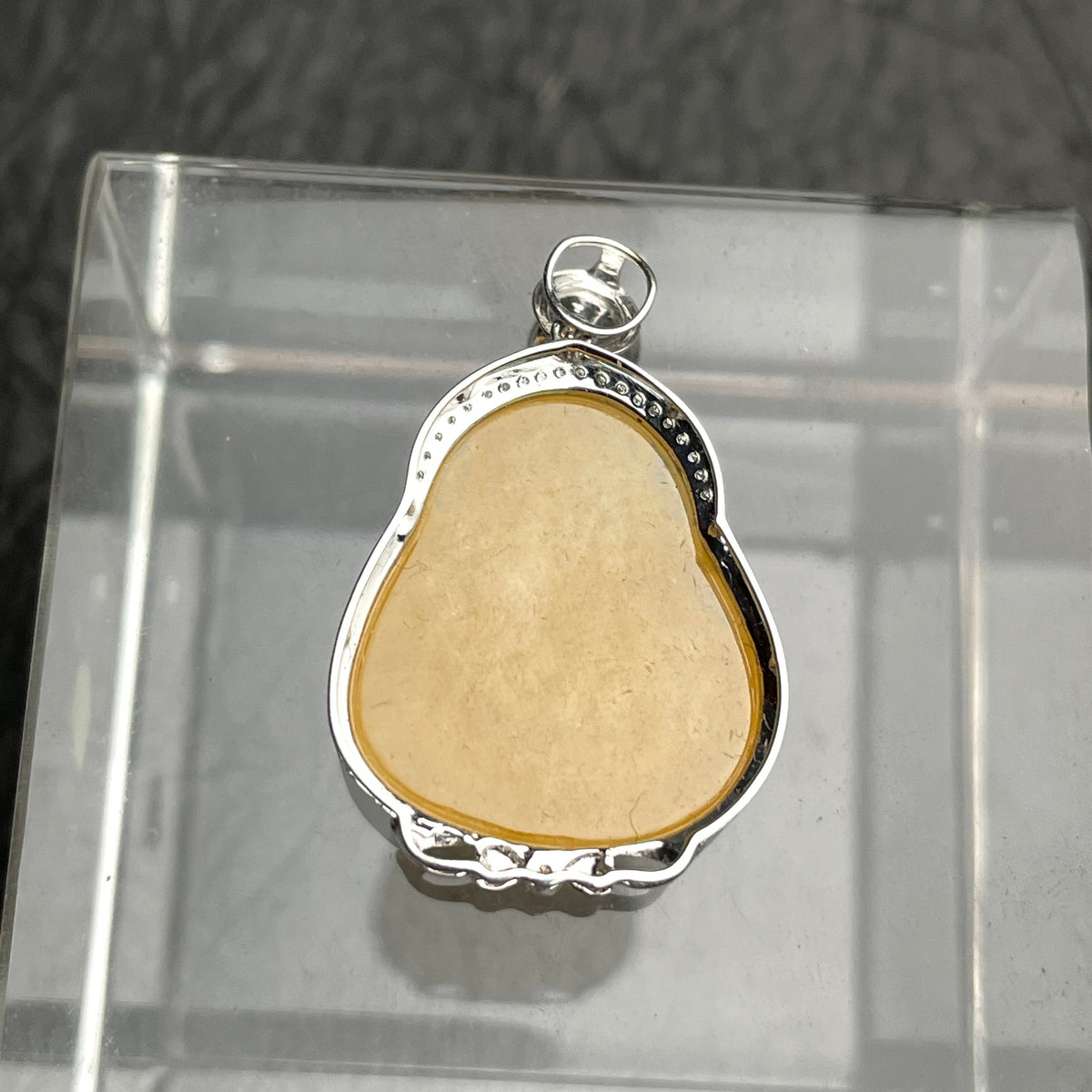 Amber Joy – Golden Jadeite Laughing Buddha Pendant