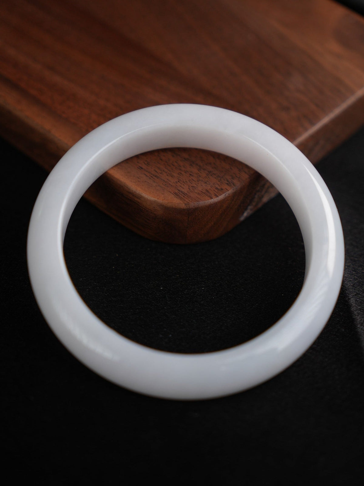 60 mm Type A jadeite bangle with pale green and lavender tones, actual piece P2509005811