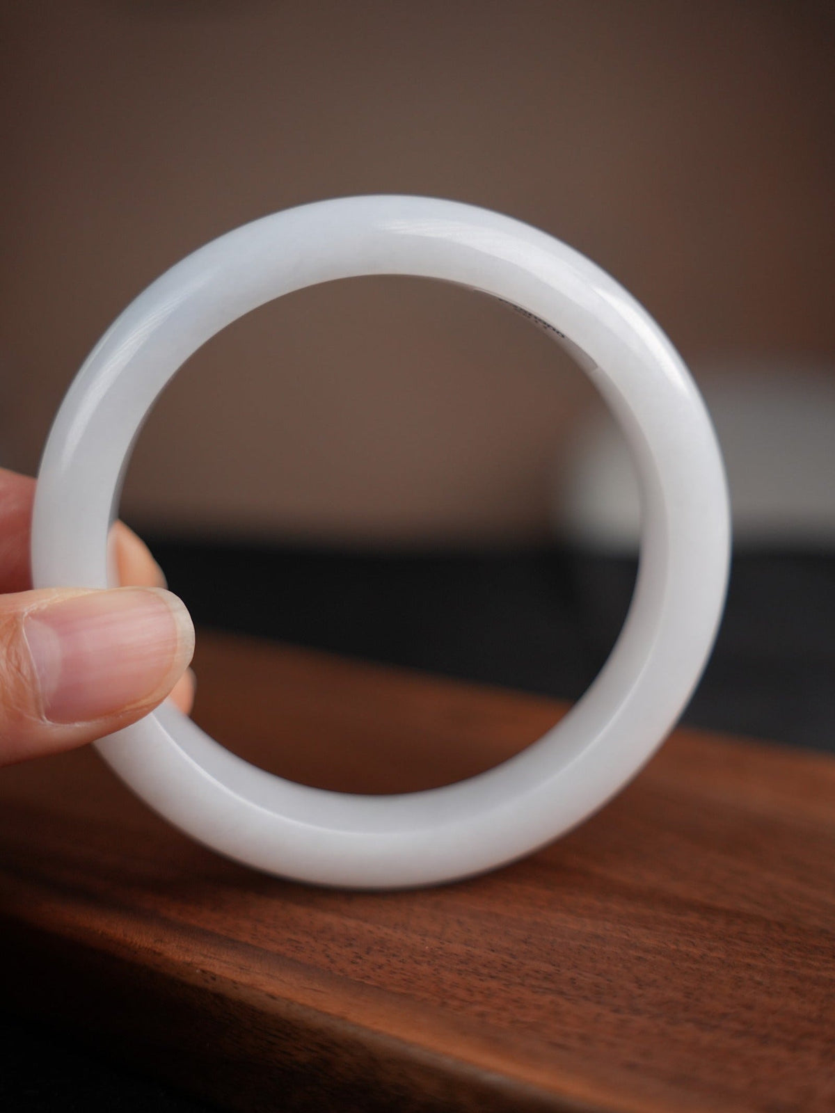 60 mm Type A jadeite bangle with pale green and lavender tones, actual piece P2509005811