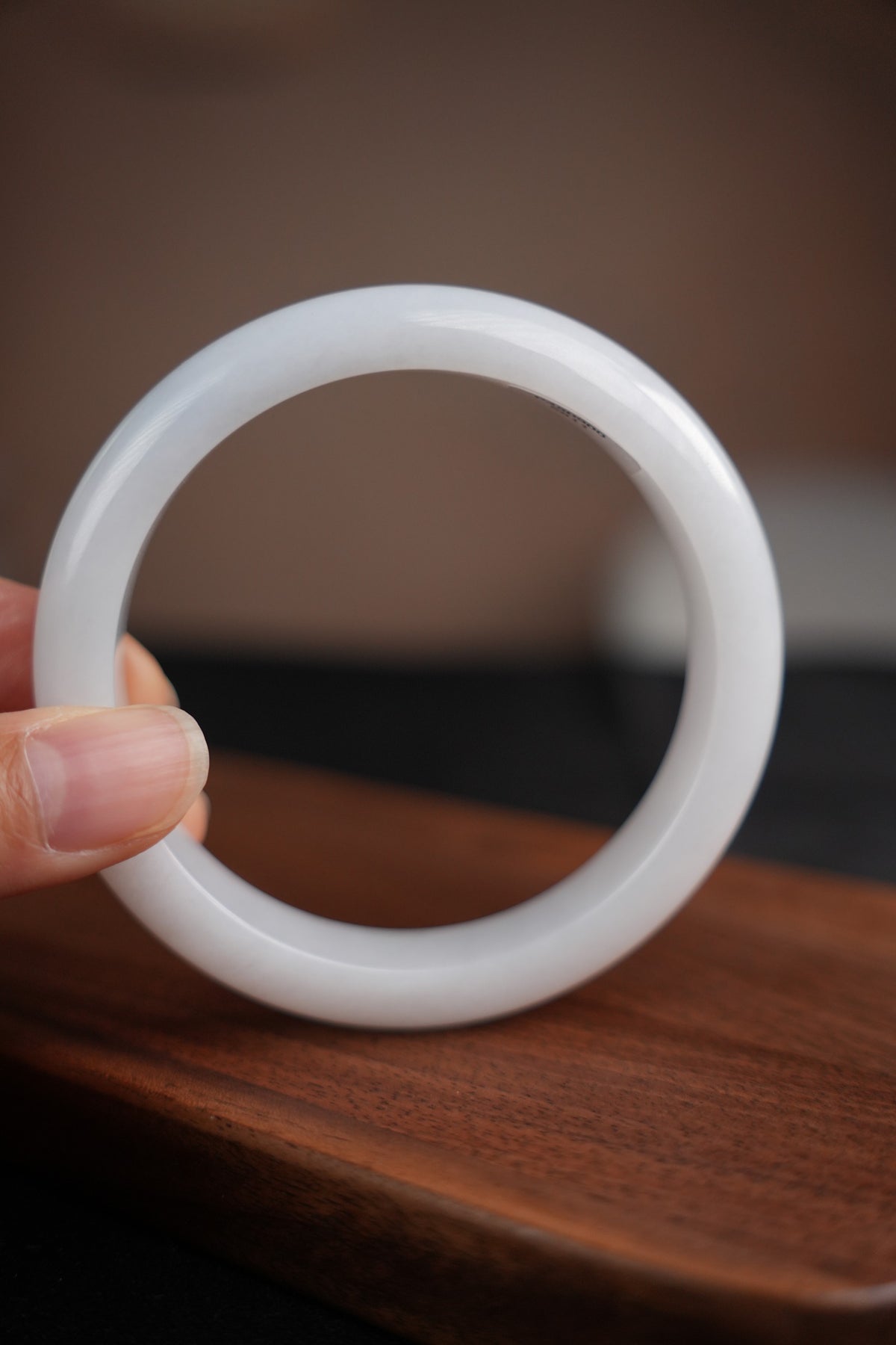 60 mm Type A jadeite bangle with pale green and lavender tones, actual piece P2509005811