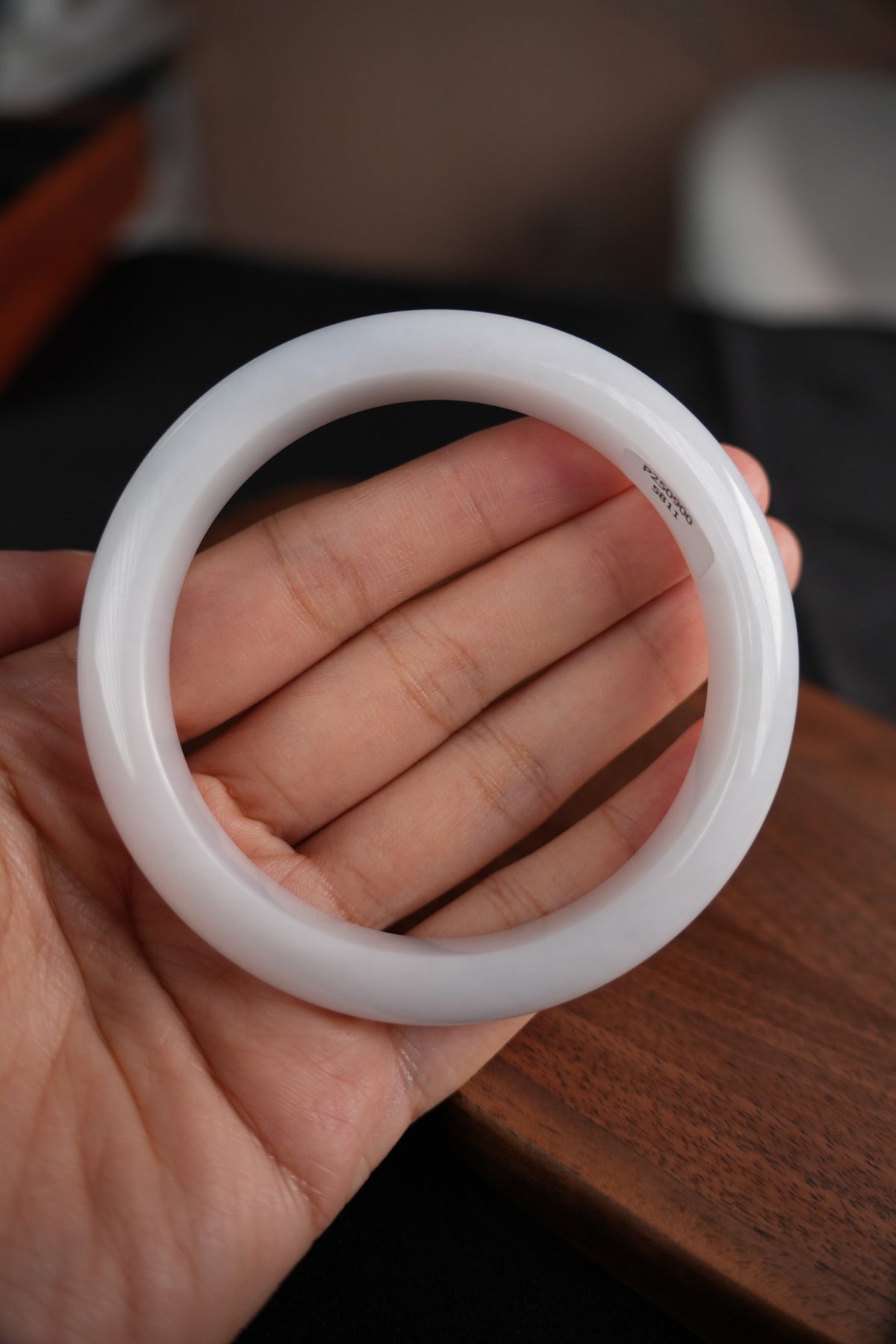 60 mm Type A jadeite bangle with pale green and lavender tones, actual piece P2509005811