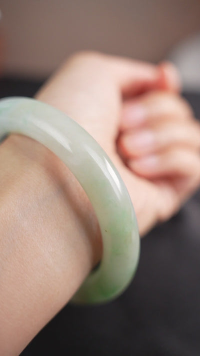 58 mm pale green and lavender Type A jadeite bangle P2505003245, worn view. Music: Satie Gymnopedie No.1 performed by Robin Alciatore, Musopen, public domain.