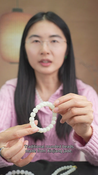 Hetian nephrite jade bead bracelet B12609024882; Chinese product explanation with English subtitles. Music: Satie Gymnopedie No.1, performed by Robin Alciatore, courtesy Musopen, public domain.