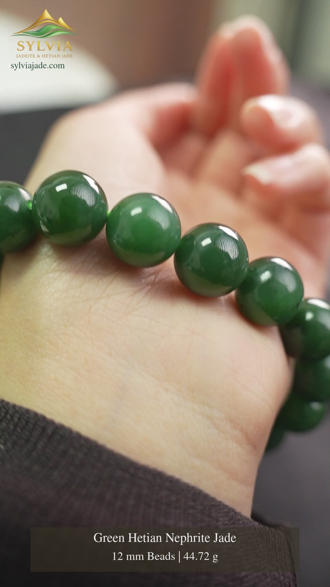 Green Hetian nephrite jade bracelet · 12 mm · 44.72 g · XJZZ26092801529. Full original frame with SylviaJade logo; piano performed by Olga Gurevich.