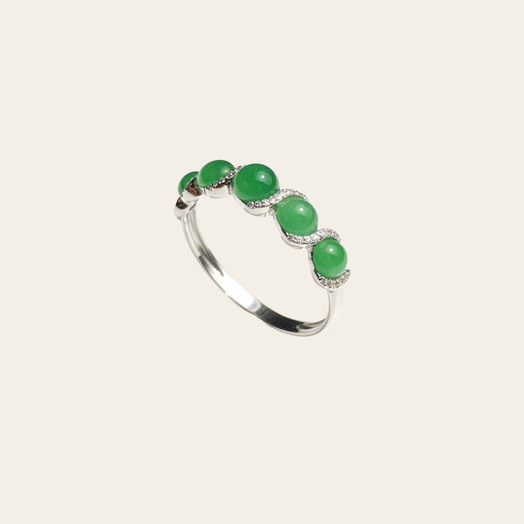 Sylvia Jewelry sterling silver ring featuring five round green jade beads accented with delicate pavé diamonds.
