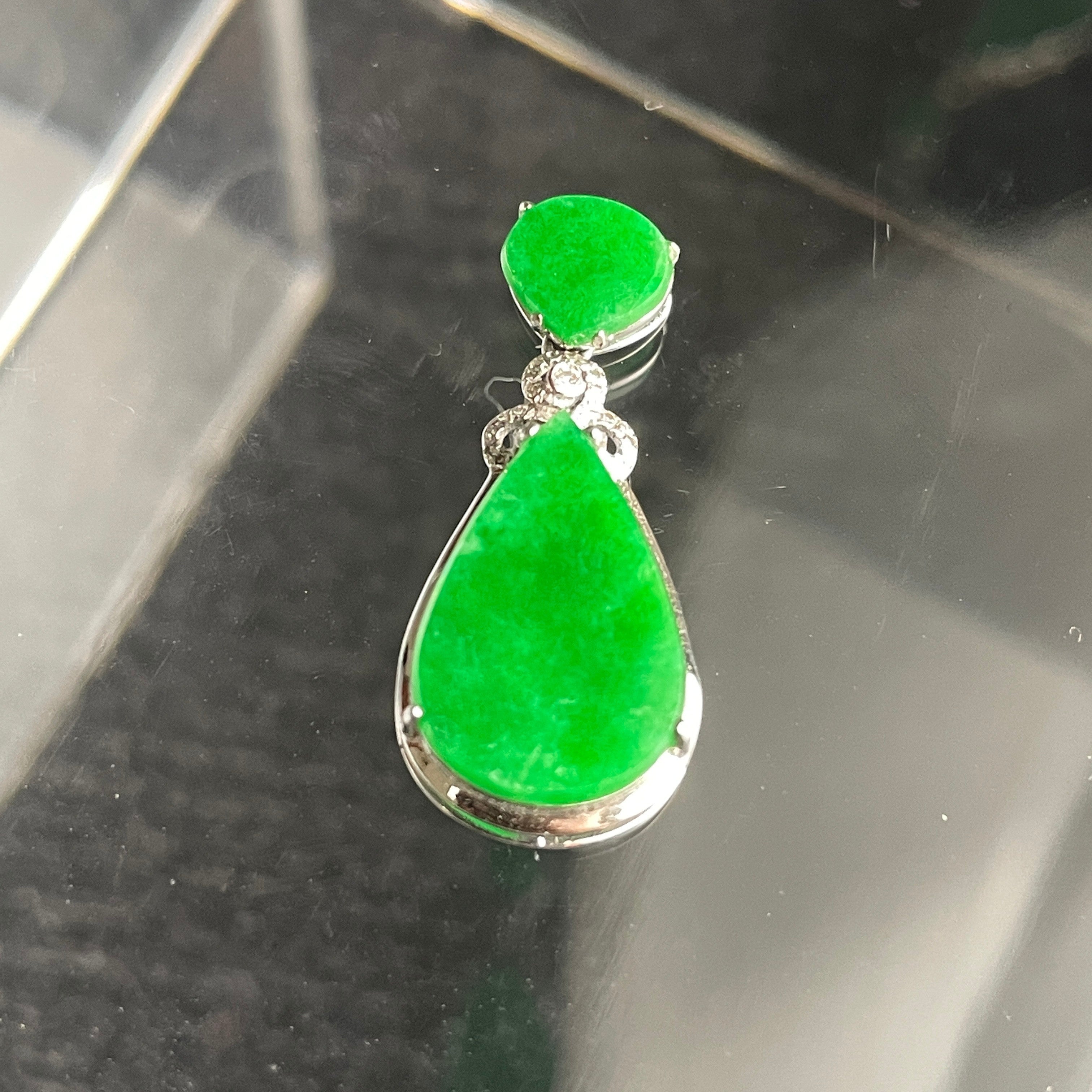 Sylvia Jewelry emerald green jadeite teardrop pendant in 18K gold with diamond-accented floral bail.