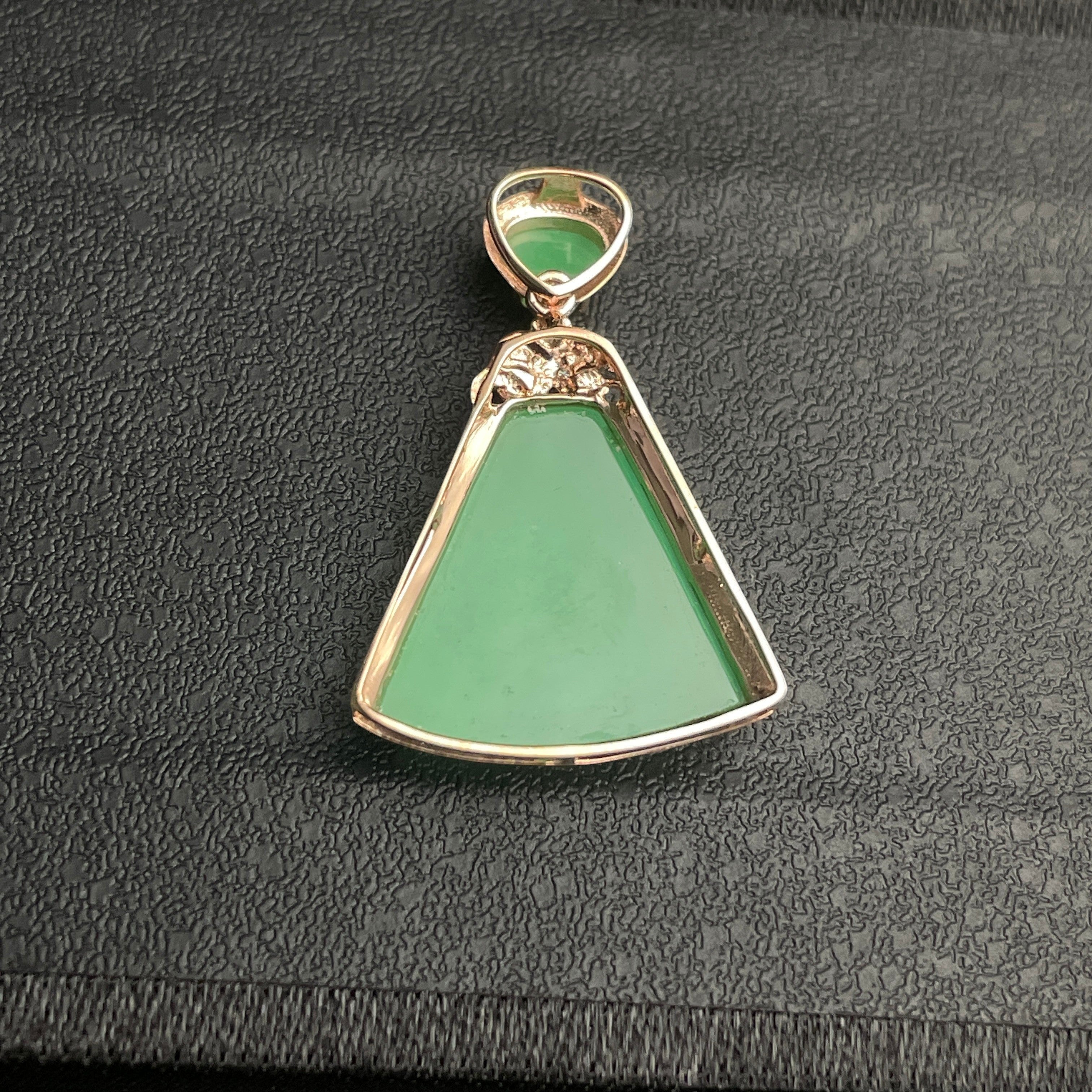 Sylvia Jewelry apple green jadeite trapezoid pendant in 18k gold with diamond accents and a triangle jadeite bail.